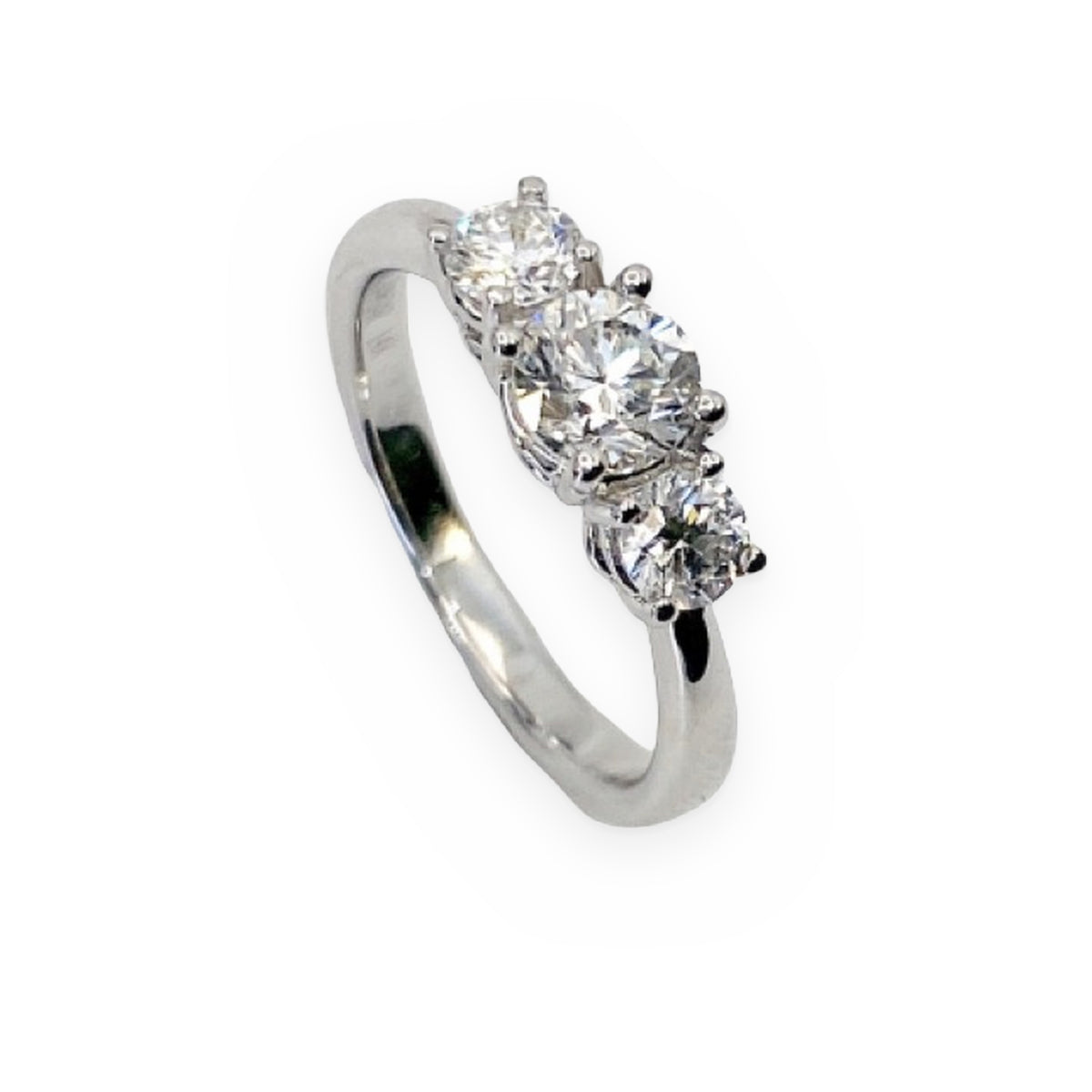 White gold three-stone round diamond engagement ring, three-quarter angle