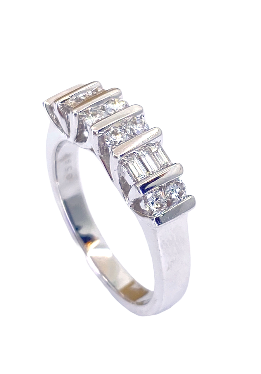 18K white gold diamond band with round and baguette diamonds, angled view