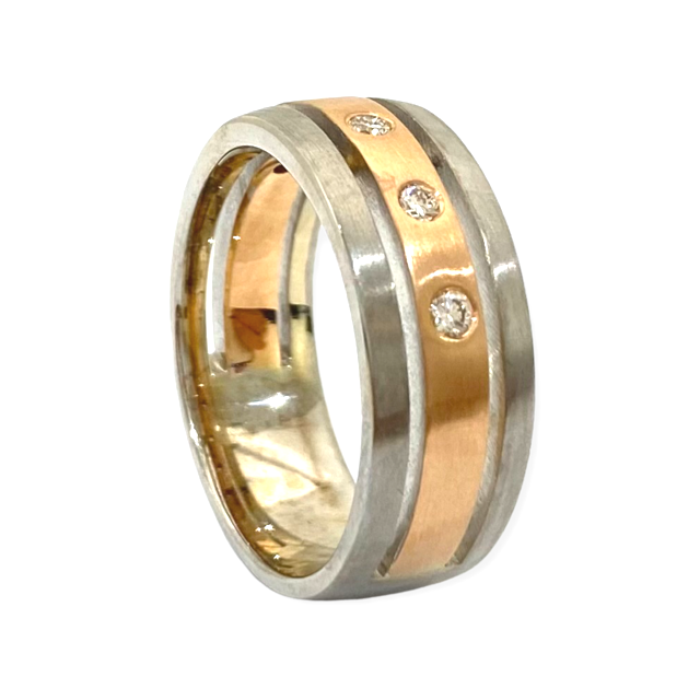 Two-tone rose and white gold flush-set diamond band, angled view