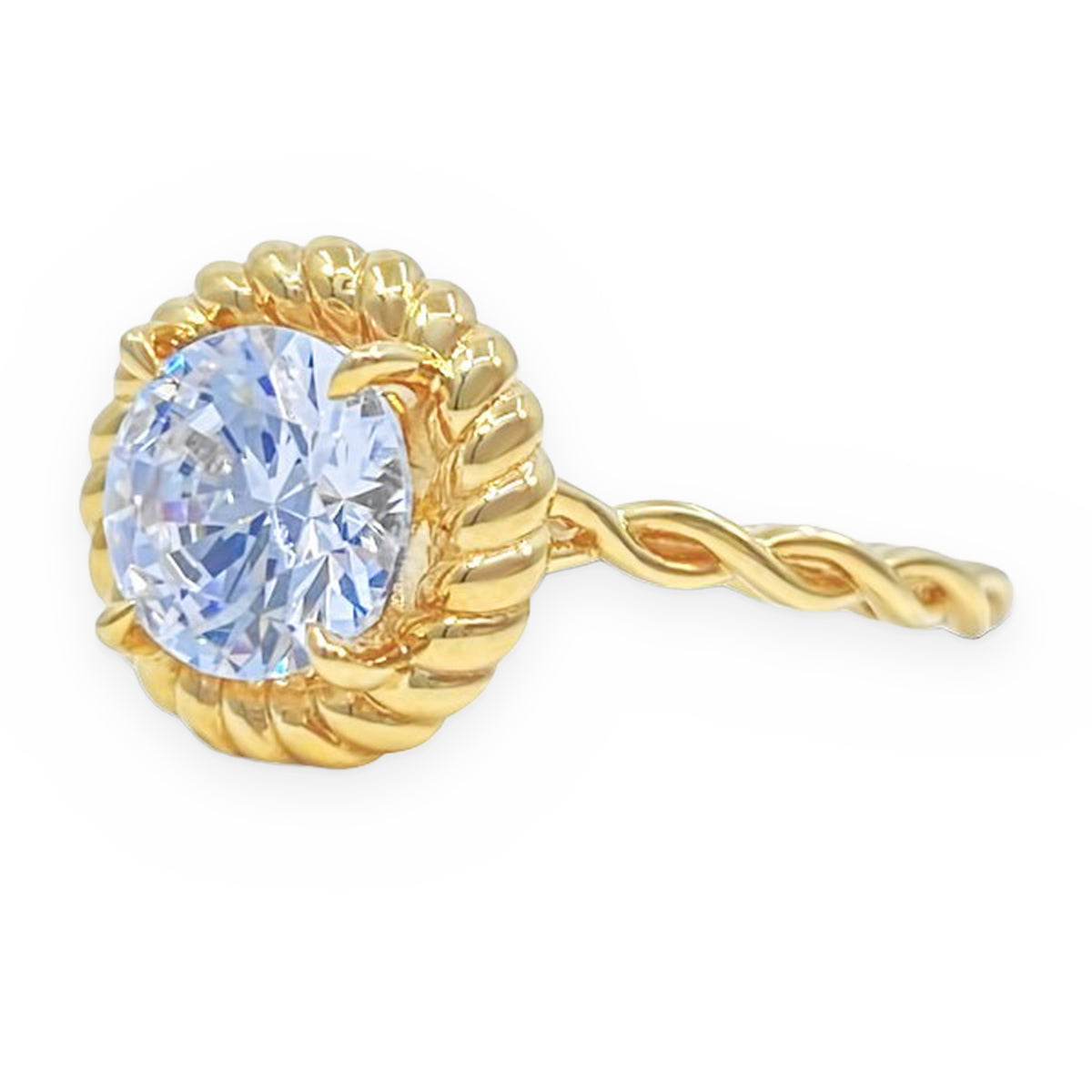 Angled render of a yellow gold rope ring with a round pale blue stone