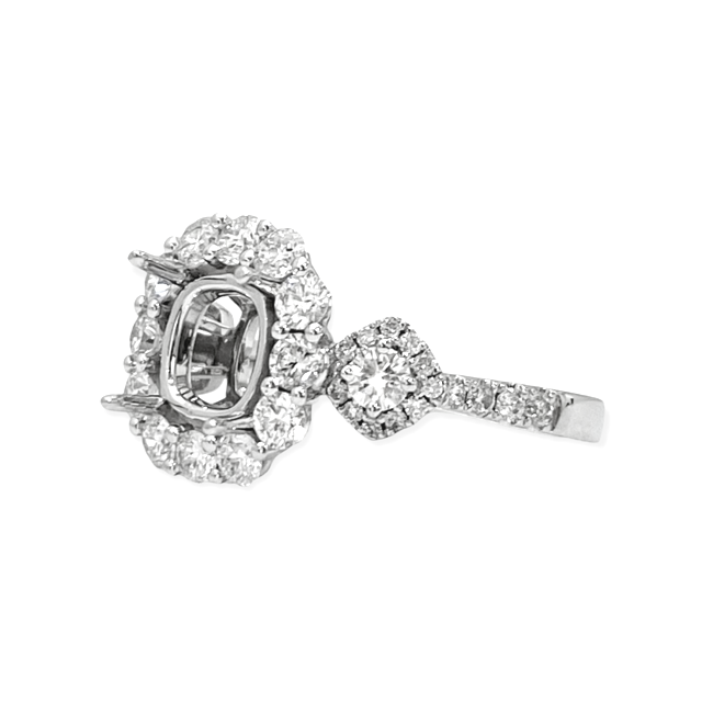 White gold cushion halo diamond engagement ring semi-mount side view showing halo and cluster shoulder