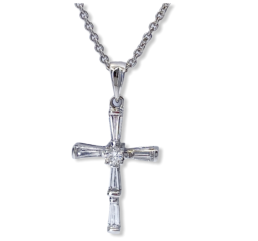 White gold diamond cross pendant with tapered baguettes