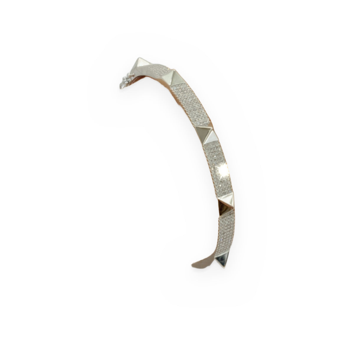White gold pave diamond pyramid stud bangle worn on a wrist