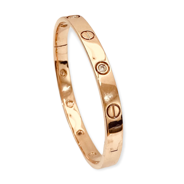 Rose gold love bangle bracelet with screw motifs and bezel diamond, angled view