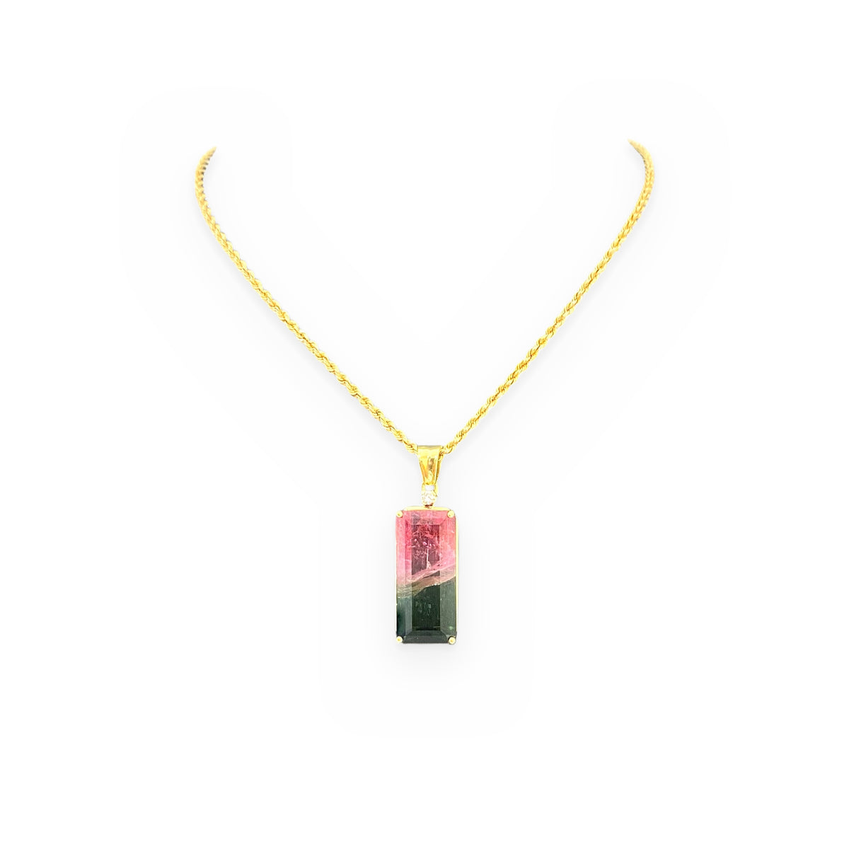 Yellow gold emerald-cut bi-color watermelon tourmaline pendant on a rope chain