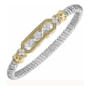 Two-tone silver and gold ribbed bangle with pave diamond elongated hexagon center station