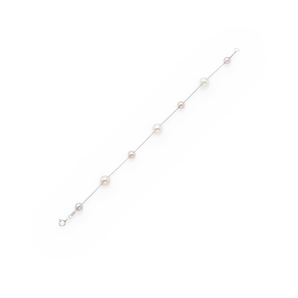 White gold pearl station bracelet shown diagonally with clasp open