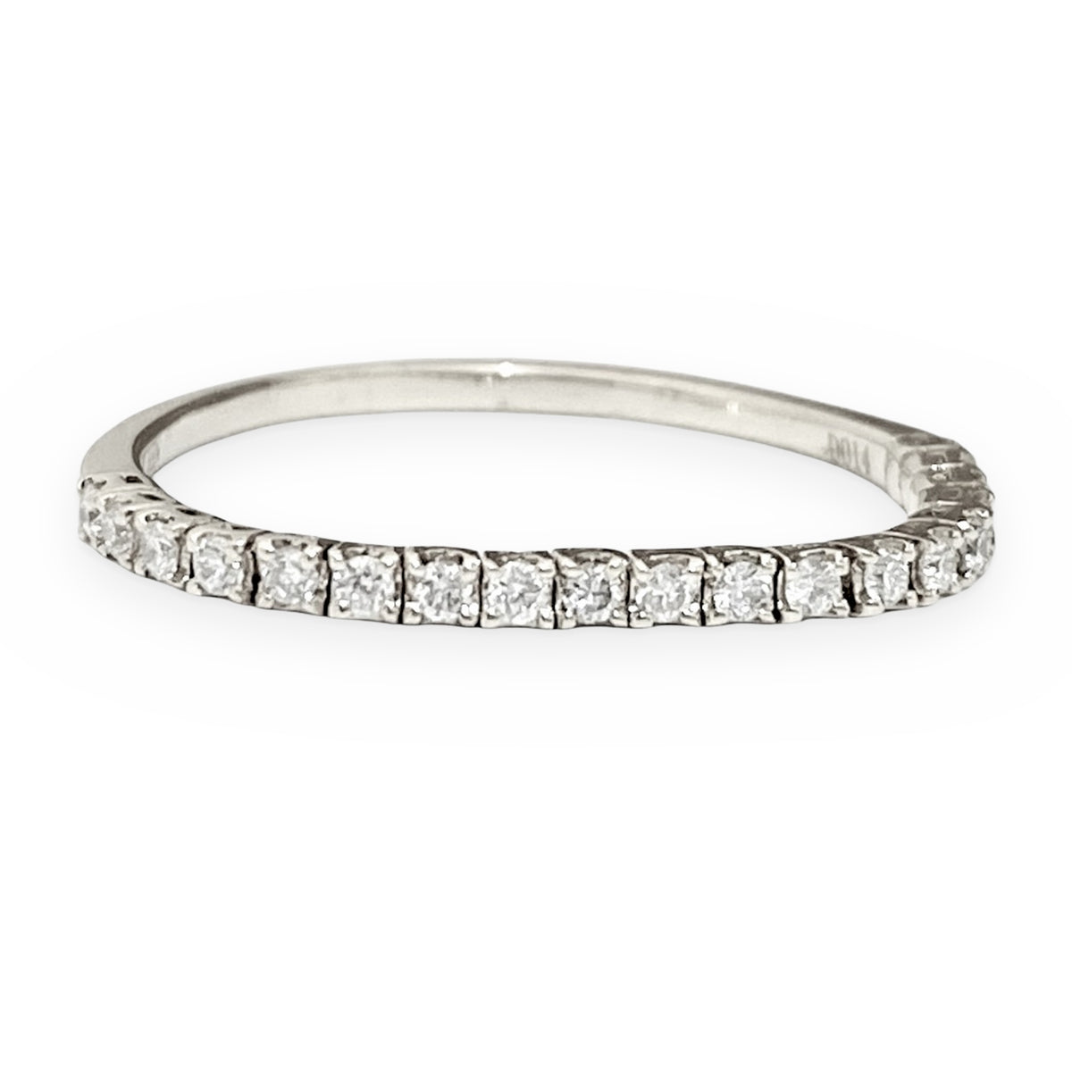 White gold flexible diamond eternity band, angled view
