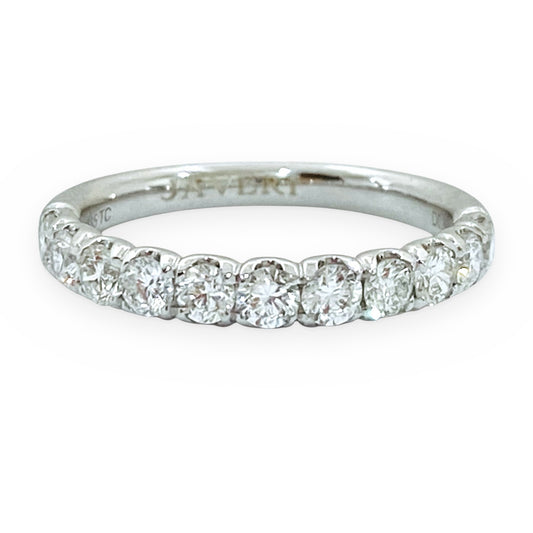 Platinum diamond wedding band with shared-prong round diamonds
