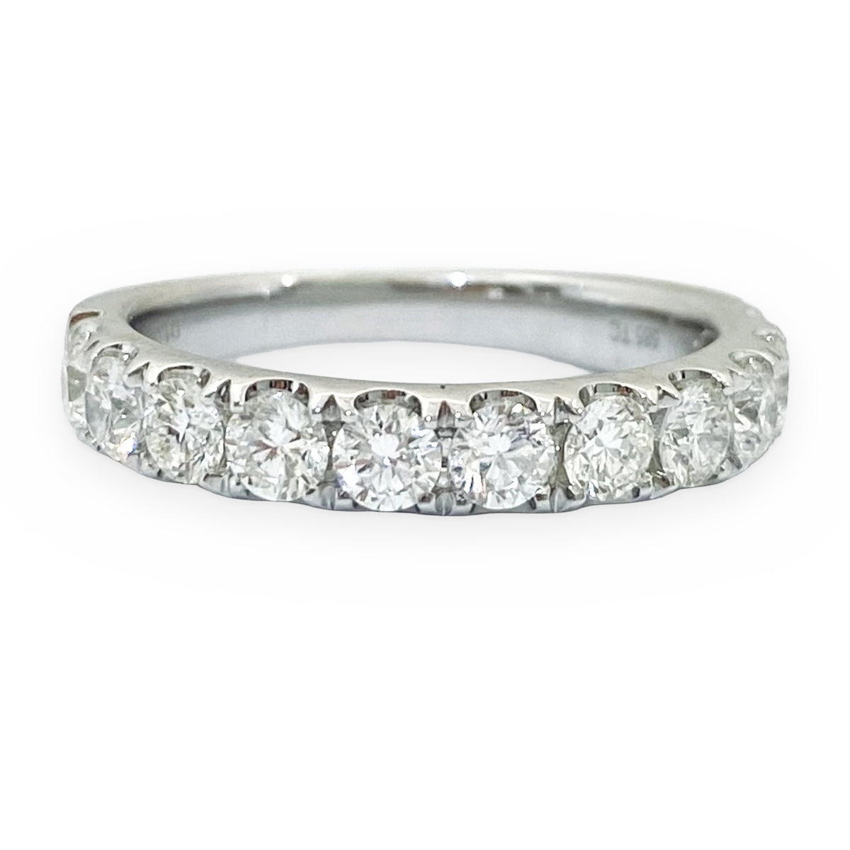 Platinum diamond wedding band with French-set round diamonds