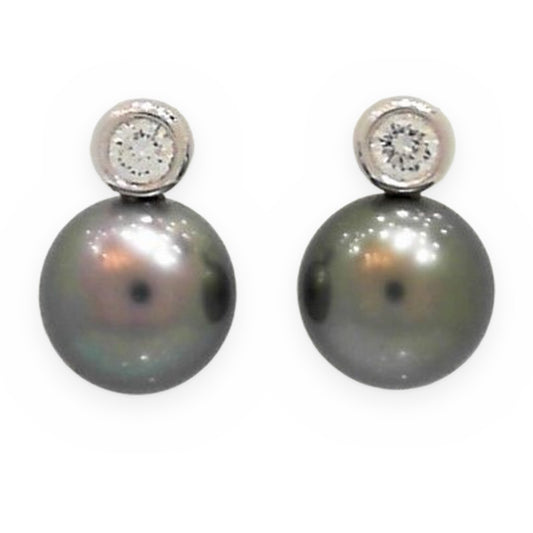 White gold Tahitian pearl stud earrings topped with bezel-set diamonds