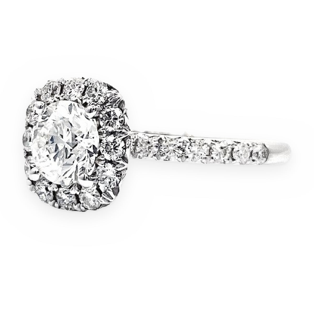 Oval diamond halo engagement ring, side profile, white gold