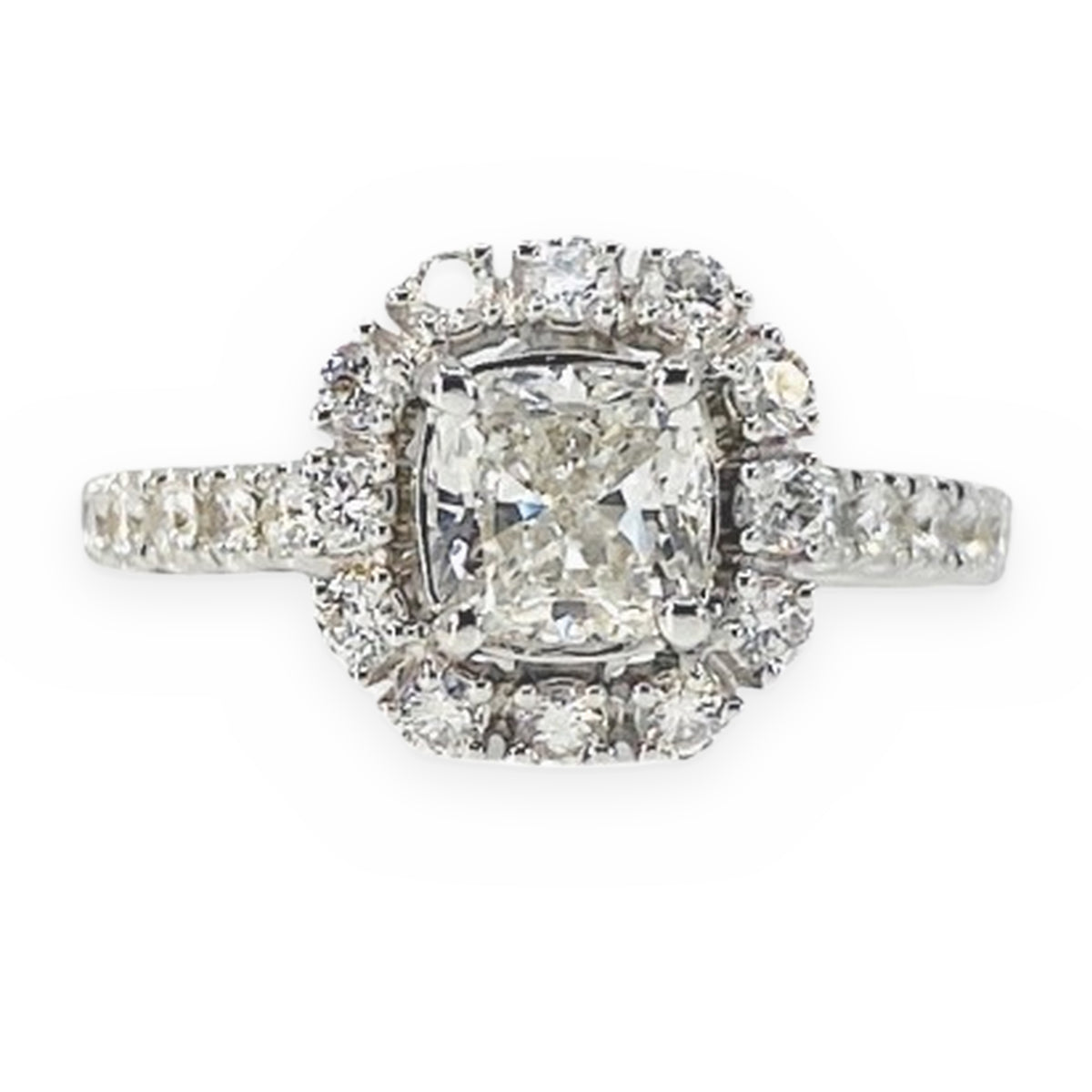 White gold cushion-cut diamond halo engagement ring with pave band, front view