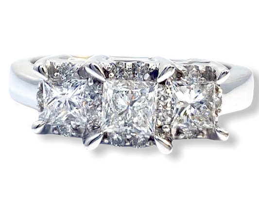 White gold three-stone princess-cut diamond engagement ring, close-up front view