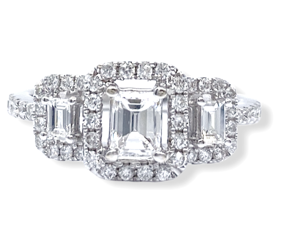 White gold three-stone emerald-cut diamond halo engagement ring, front view