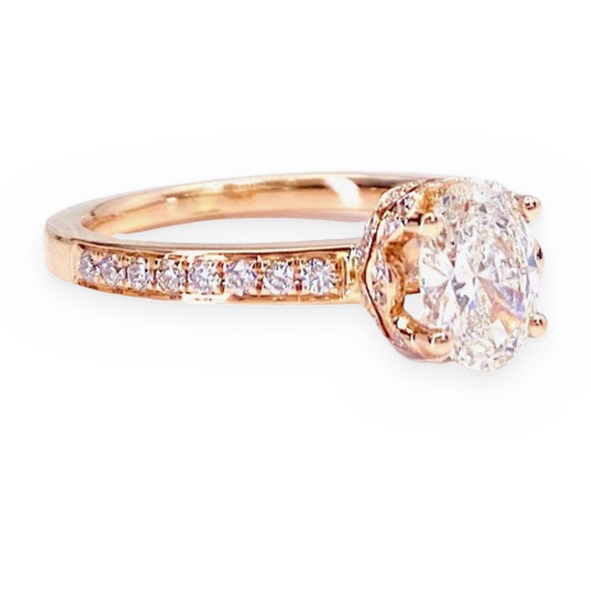 Rose gold oval diamond solitaire engagement ring with matching diamond band set