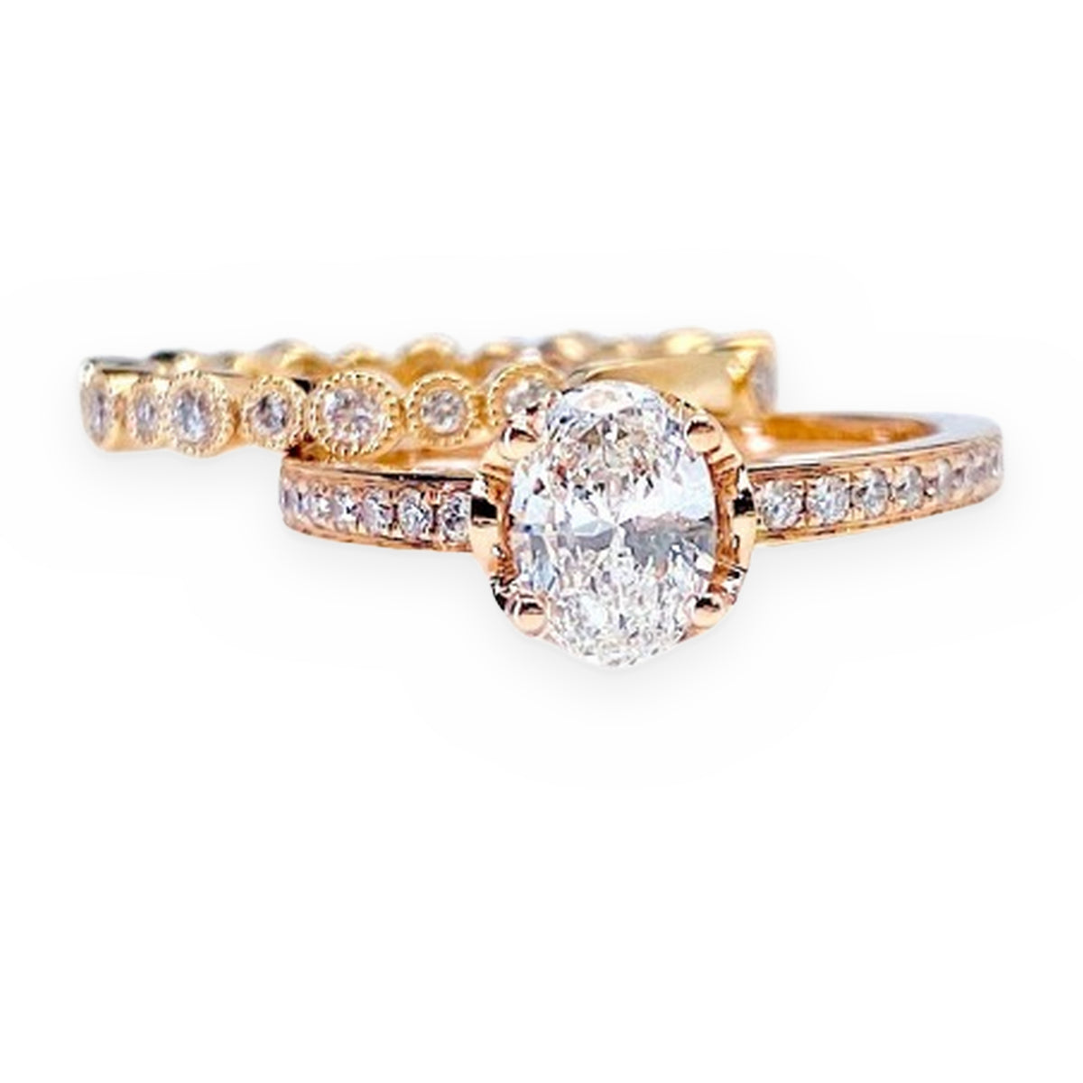 Rose gold oval diamond solitaire engagement ring, three-quarter angle