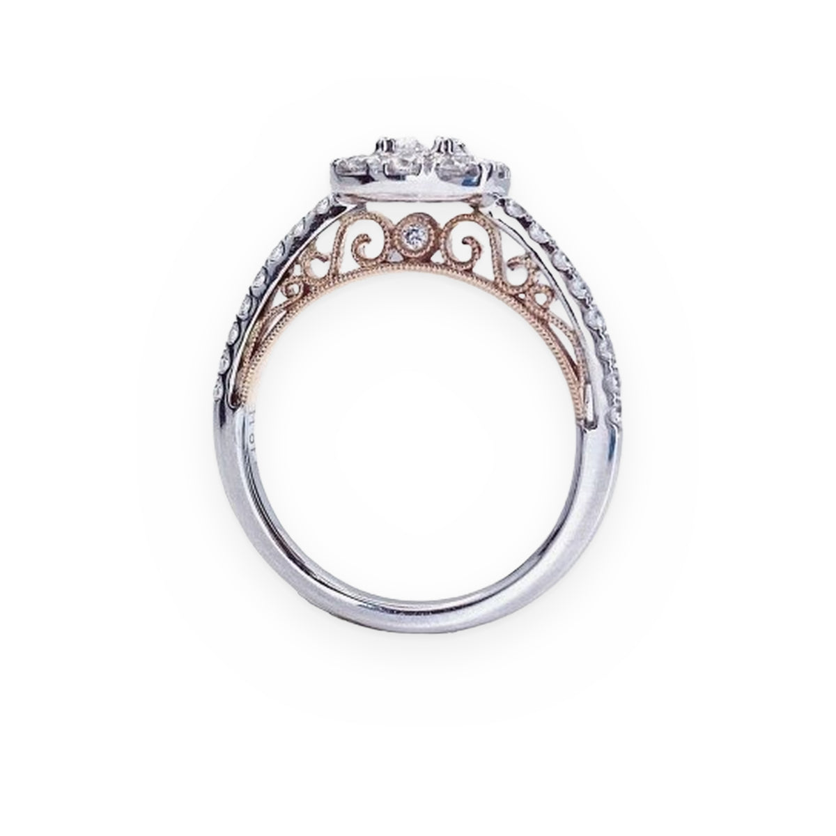 Two-tone gold diamond cluster halo engagement ring, side profile with rose gold filigree