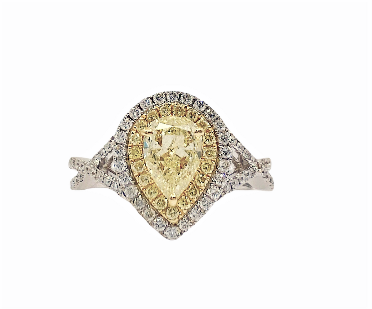Two-tone gold pear-shaped fancy yellow diamond double halo engagement ring, front view