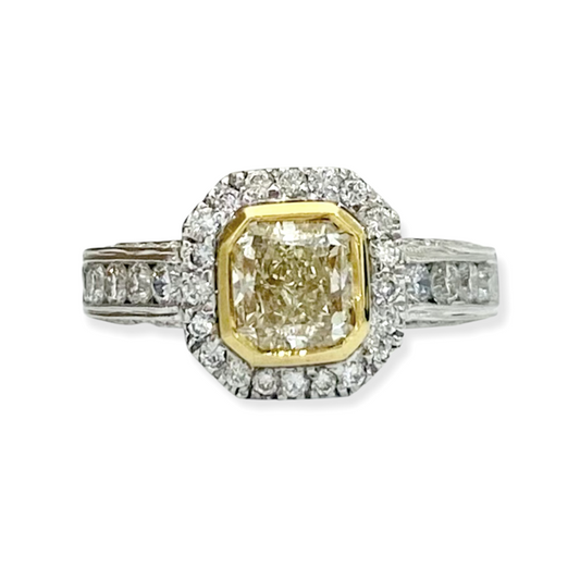 Two-tone gold radiant fancy yellow diamond bezel halo engagement ring, front view