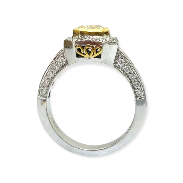 Two-tone gold fancy yellow diamond halo engagement ring, side profile with gold filigree gallery