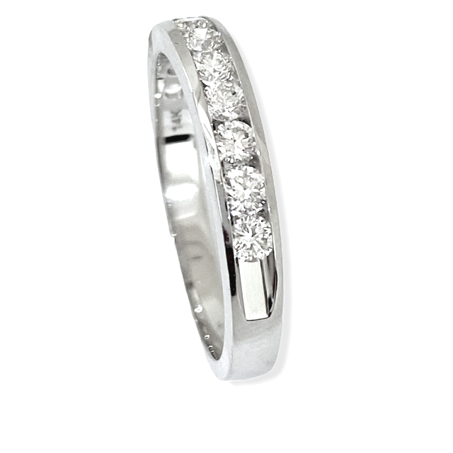 White gold channel-set round diamond wedding band, side profile