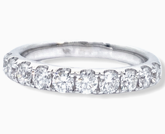 White gold shared-prong round diamond wedding band