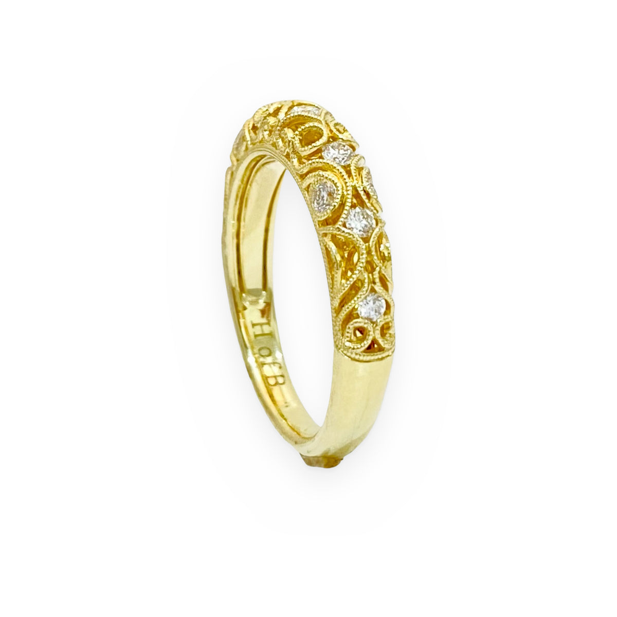 Yellow gold filigree diamond band, angled view