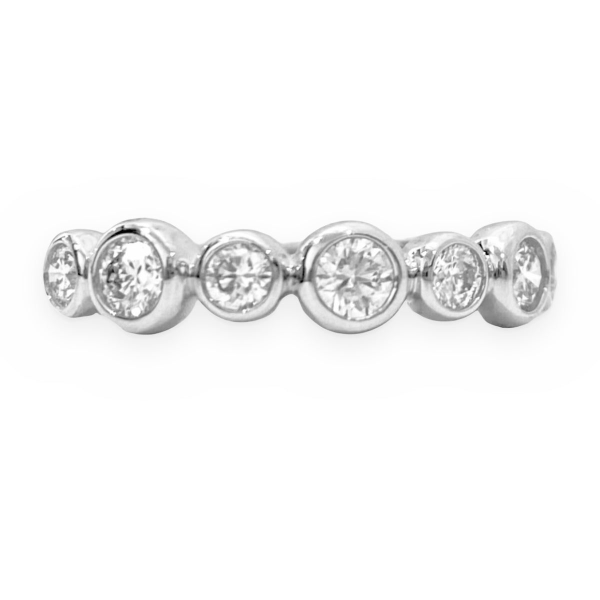 White gold bezel-set round diamond band