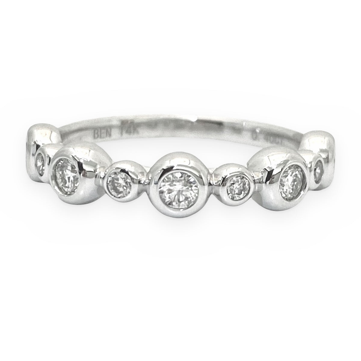 White gold graduated bezel-set diamond band
