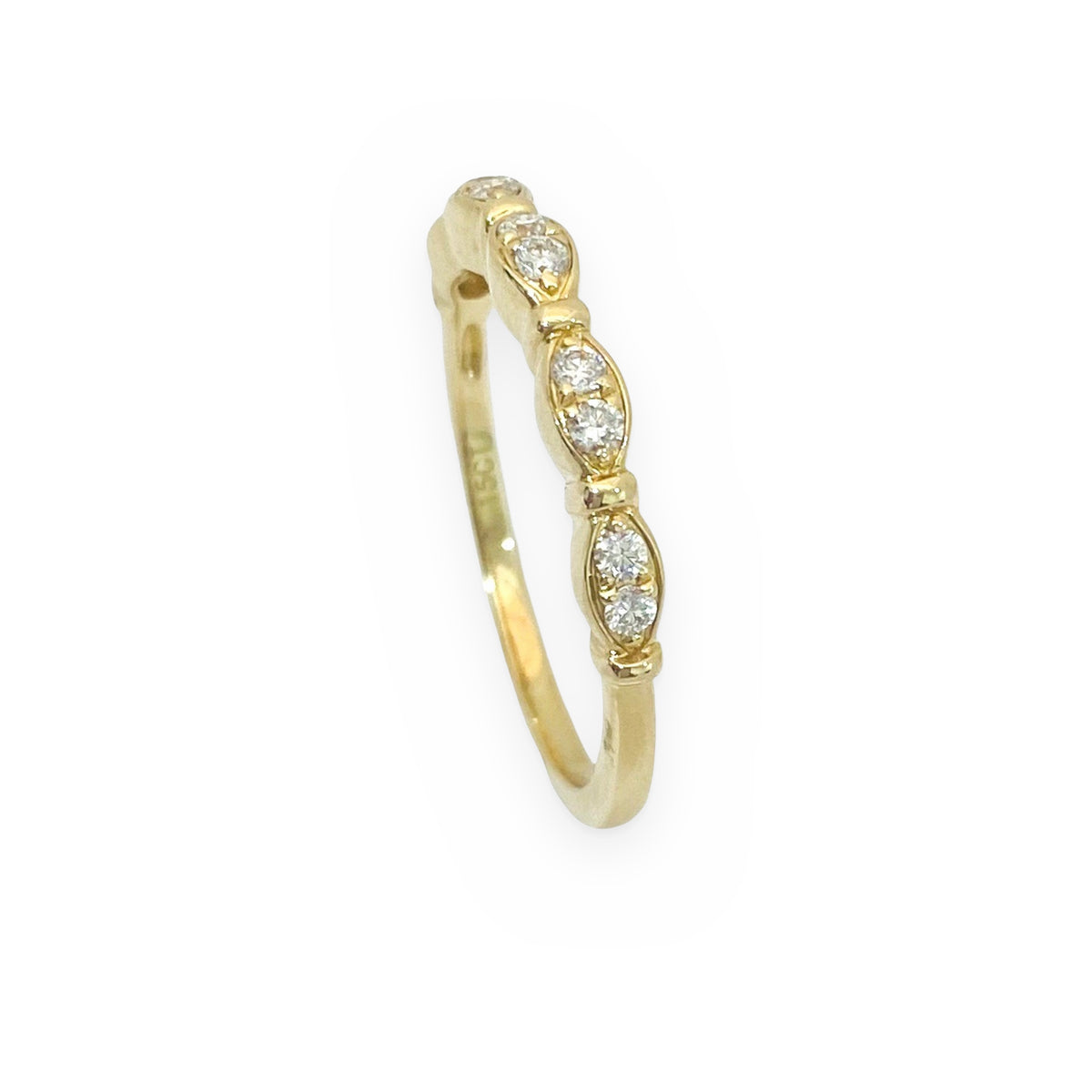 Yellow gold marquise-station diamond band, angled view