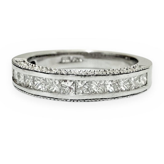 White gold channel-set princess-cut diamond wedding band with milgrain edges