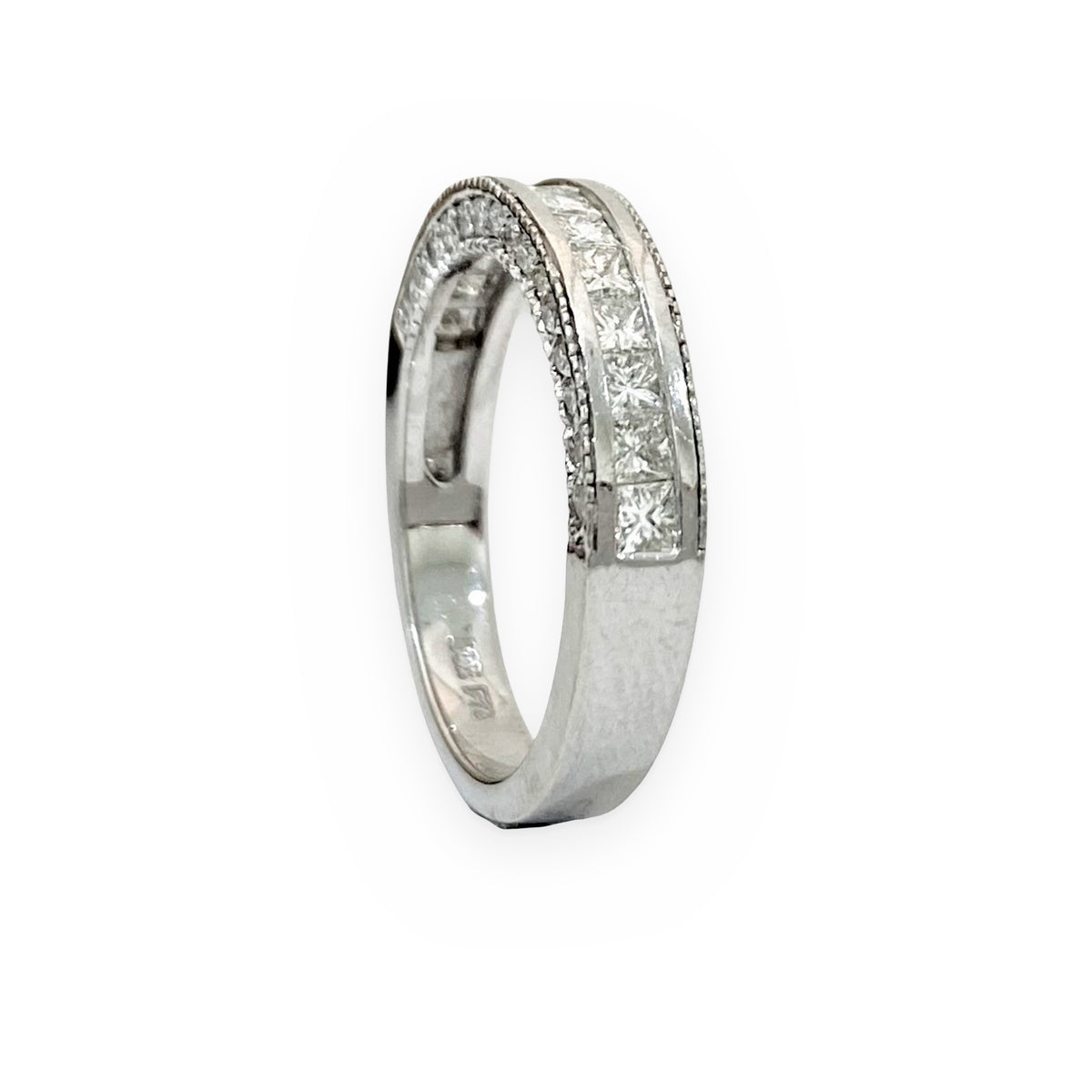 White gold princess-cut channel diamond band, angled view