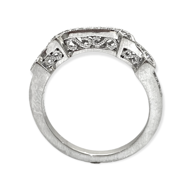 White gold vintage-style filigree diamond band, angled view