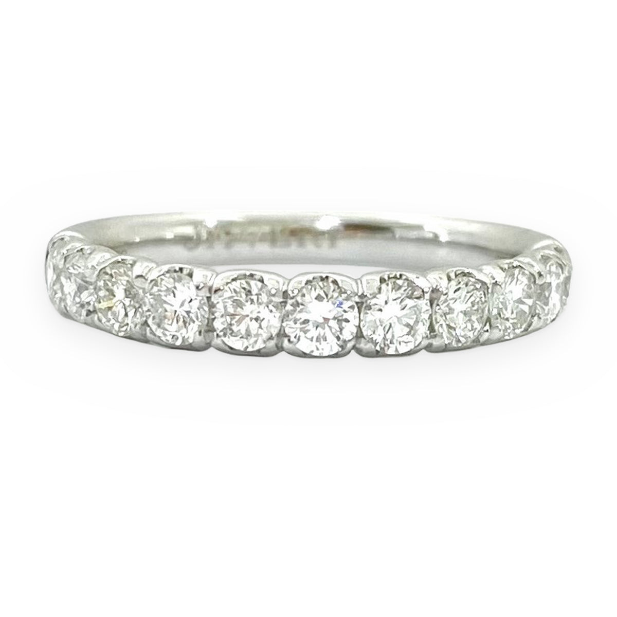 White gold shared-prong round diamond band
