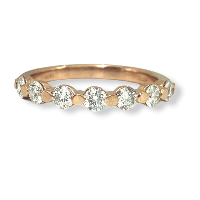 Rose gold shared-prong round diamond wedding band