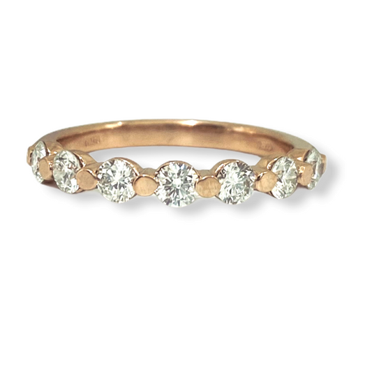Rose gold shared-prong round diamond wedding band