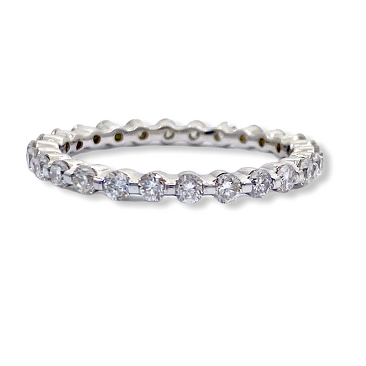 White gold shared-prong round diamond eternity band