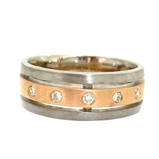 Two-tone rose and white gold band with flush-set diamonds