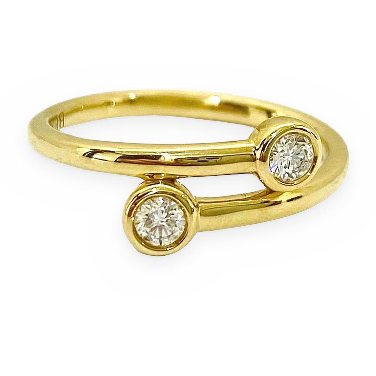 Yellow gold two-diamond bypass ring, side view