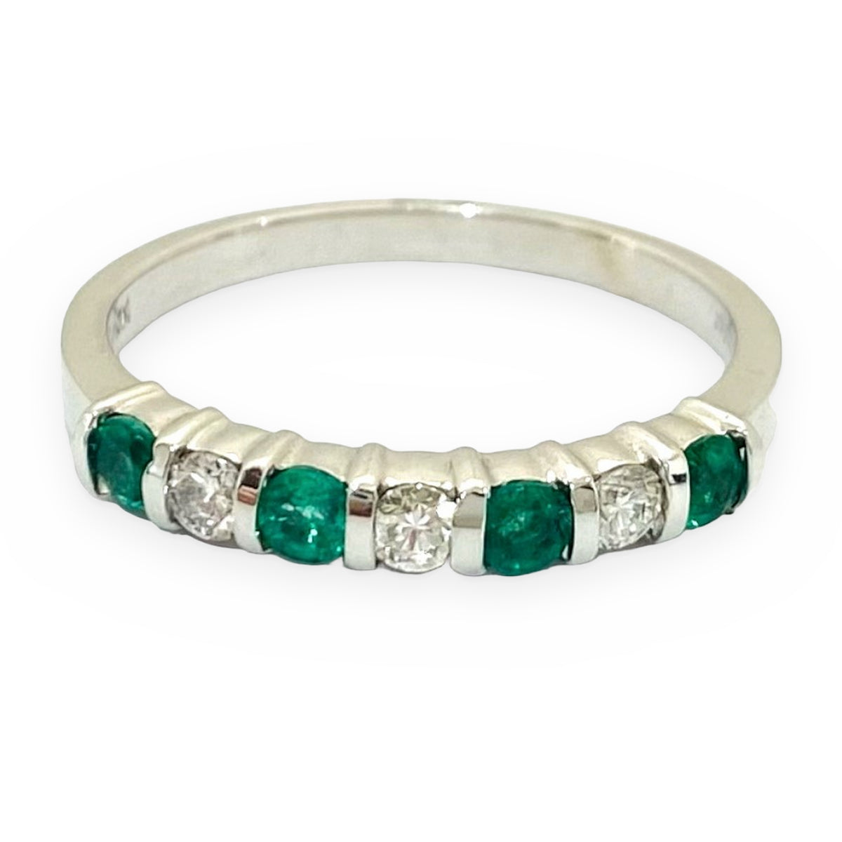 White gold emerald and diamond alternating band, front view