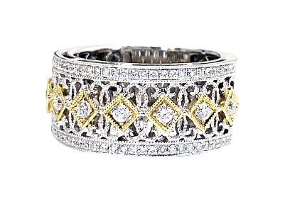Two-tone white and yellow gold wide band with diamond kite motifs
