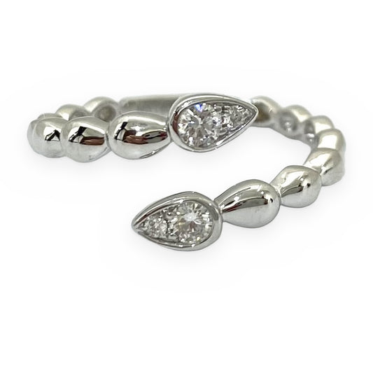 White gold bypass ring with pear-shaped diamond clusters and beaded shank