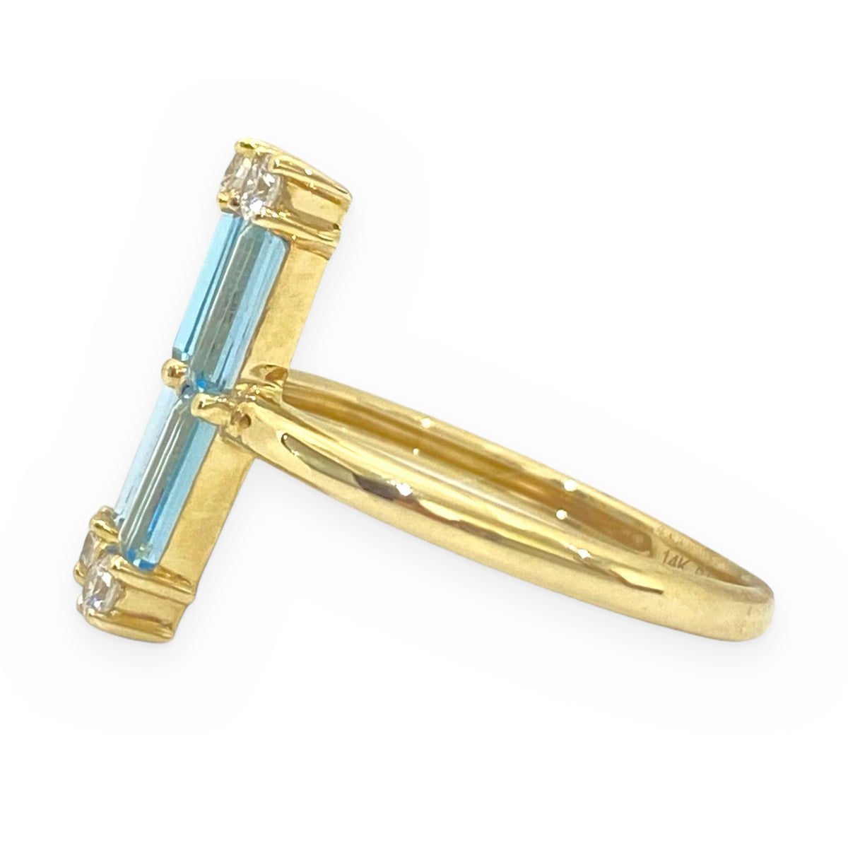 14K yellow gold blue topaz baguette bar ring, profile view