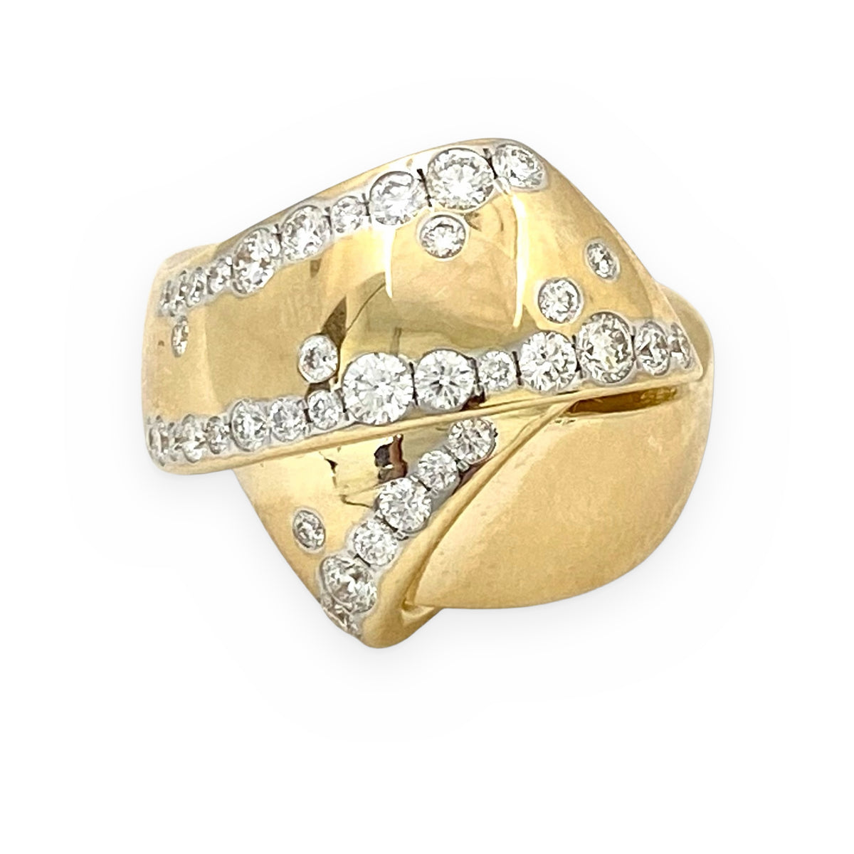 Yellow gold wide dome ring with flush-set diamond wave pattern