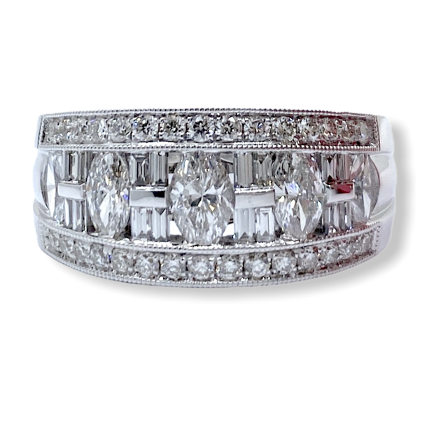 White gold band with marquise diamonds, baguettes and round diamond edges