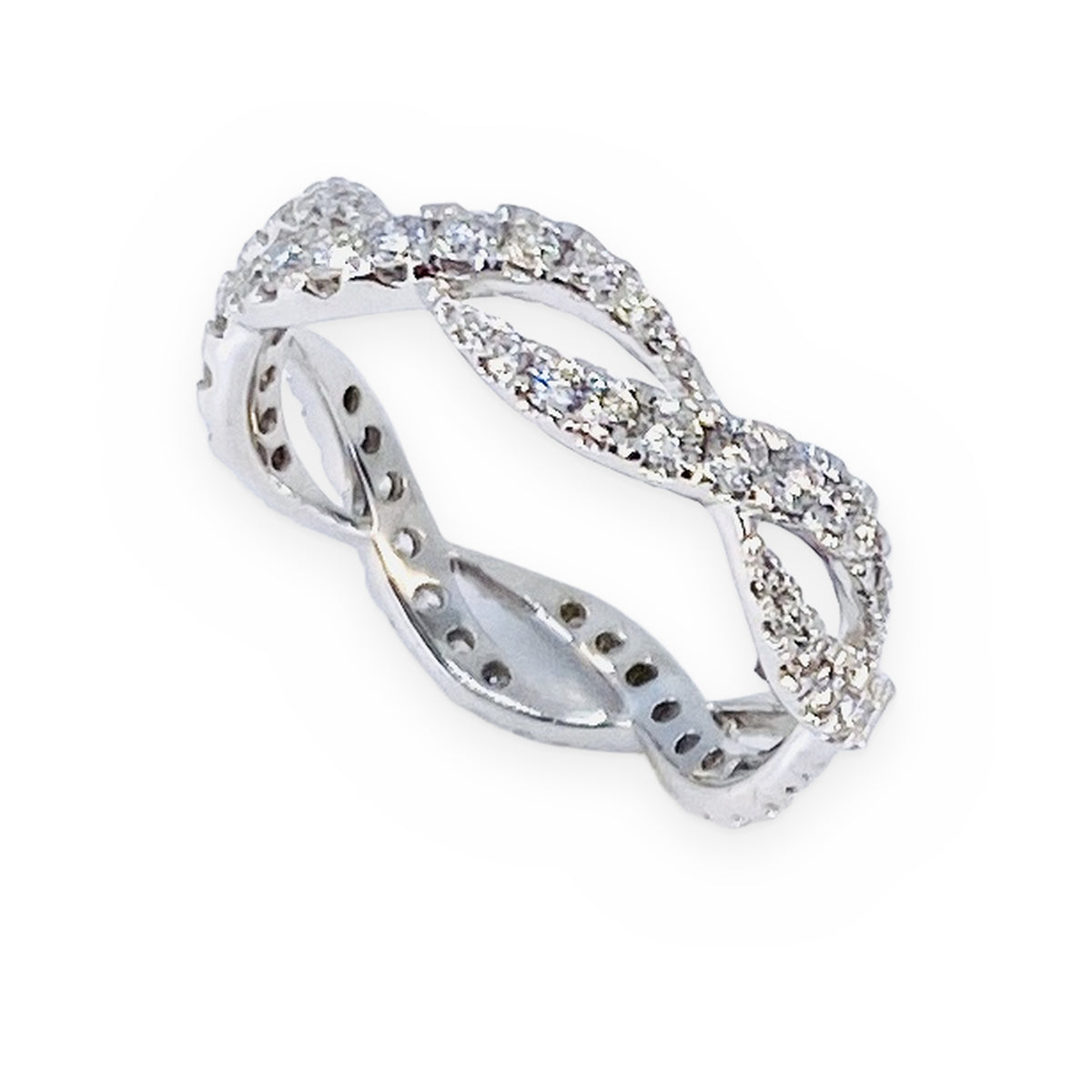 White gold twisted infinity diamond eternity band, angled