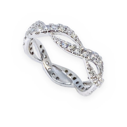 White gold twisted infinity diamond eternity band, angled