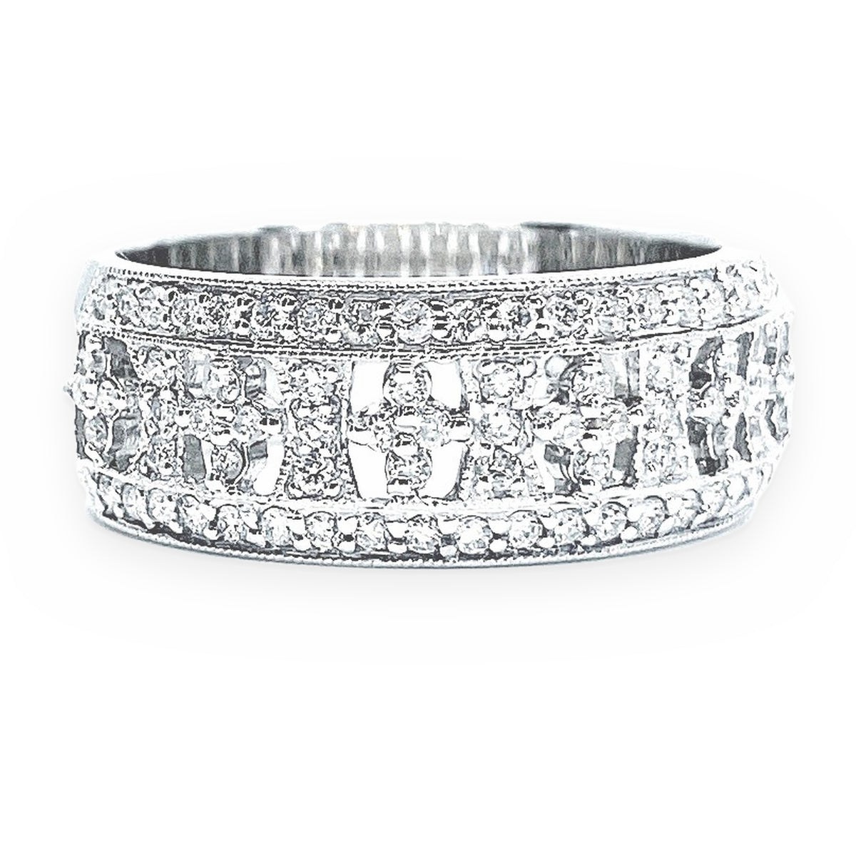 White gold diamond band with openwork pattern framed by pave diamond edges