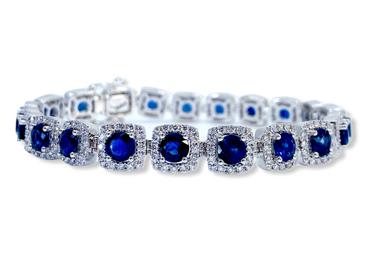White gold ring with a large oval opal cabochon and diamond-set split shoulders